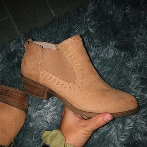 Tan booties.